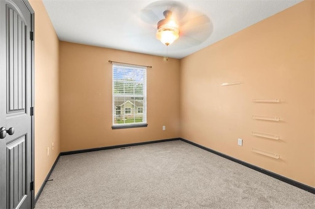 610 NW Green Dr, Grain Valley, MO 64029 - spare room featuring ceiling fan and carpet flooring