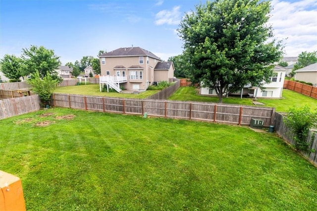 610 NW Green Dr, Grain Valley, MO 64029 - fenced backyard with a residential view