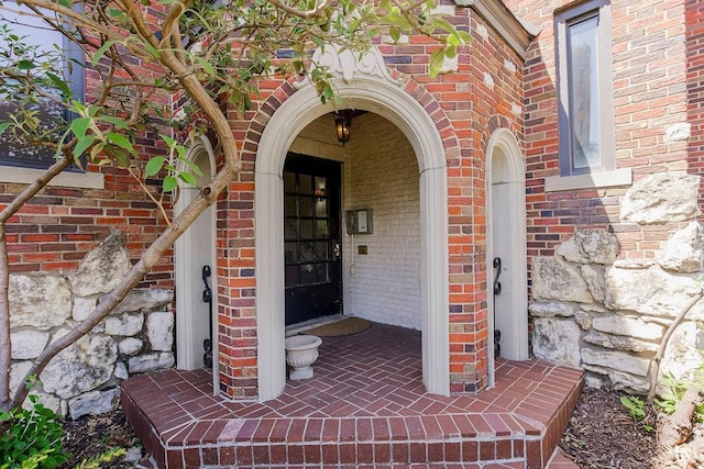 700 W 48th St Unit 301, Kansas City, MO 64112 - property entrance featuring brick siding and stone siding
