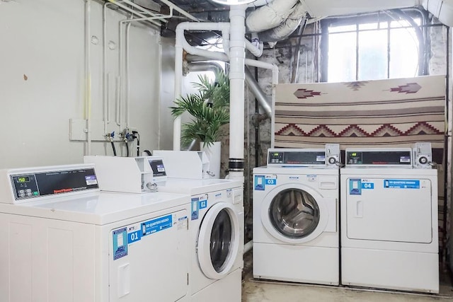 700 W 48th St Unit 301, Kansas City, MO 64112 - communal laundry room featuring washing machine and clothes dryer