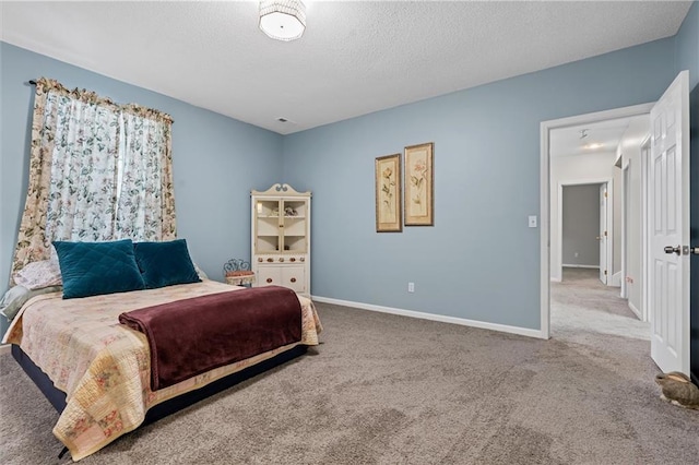 4116 NE 83rd St, Kansas City, MO 64119 - carpeted bedroom featuring a textured ceiling and baseboards