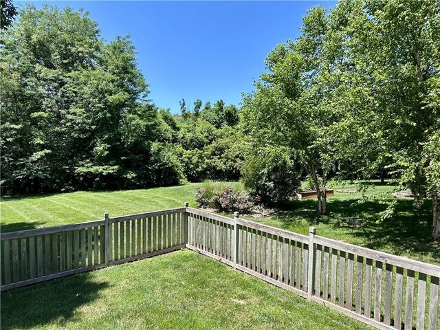 15598 S Blackfeather St, Olathe, KS 66062 - view of fenced backyard