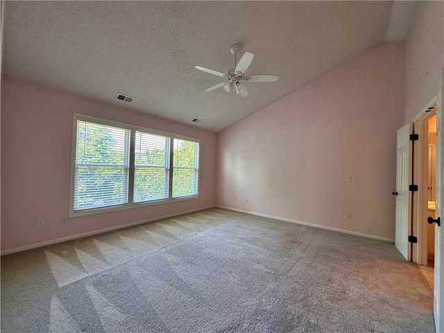 15598 S Blackfeather St, Olathe, KS 66062 - empty room with a ceiling fan, light carpet, a textured ceiling, and high vaulted ceiling