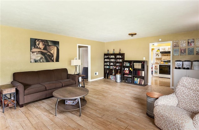 3722 Robinson Pike Rd, Grandview, MO 64030 - living room with wood finished floors and baseboards