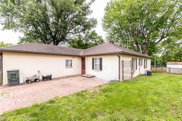 3722 Robinson Pike Rd, Grandview, MO 64030 - rear view of house featuring stucco siding and a patio