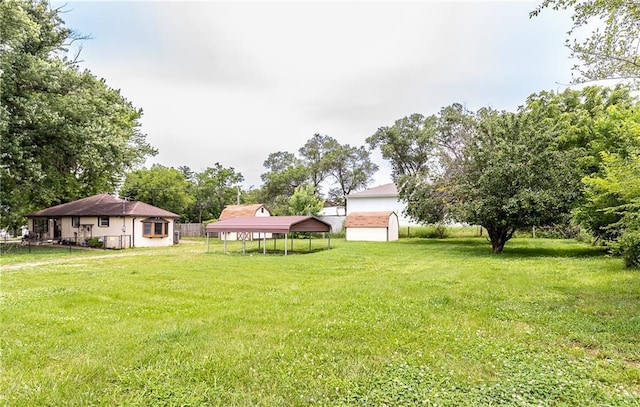 3722 Robinson Pike Rd, Grandview, MO 64030 - view of green lawn featuring a shed