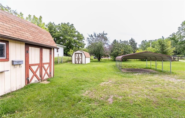 3722 Robinson Pike Rd, Grandview, MO 64030 - view of green lawn with a shed and a detached carport
