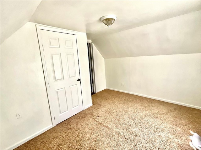 1870 N 27th St, Kansas City, KS 66104 - bonus room featuring carpet floors and lofted ceiling