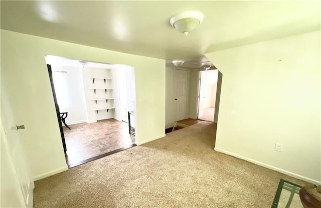 1870 N 27th St, Kansas City, KS 66104 - carpeted spare room featuring baseboards