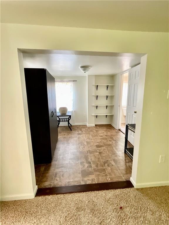 1870 N 27th St, Kansas City, KS 66104 - hall with baseboards and built in shelves