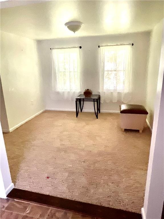1870 N 27th St, Kansas City, KS 66104 - sitting room with baseboards and carpet flooring