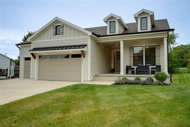 25411 W 142nd Pl, Olathe, KS 66061 - view of front of property with covered porch, a front yard, concrete driveway, roof with shingles, and board and batten siding