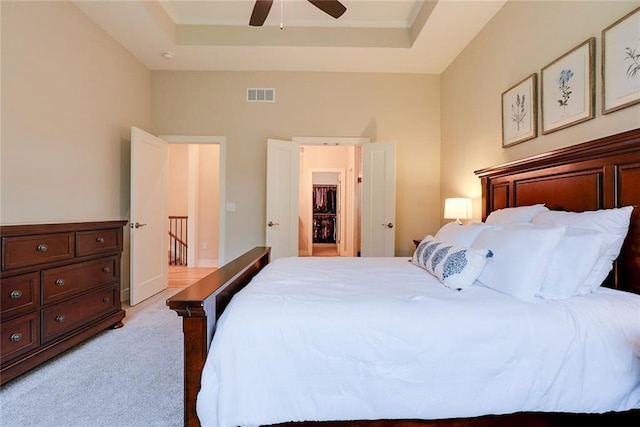 25411 W 142nd Pl, Olathe, KS 66061 - bedroom featuring light carpet, a raised ceiling, and a ceiling fan