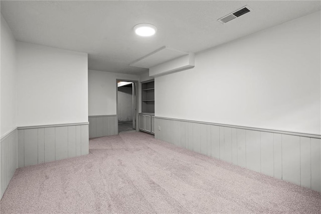 9602 W 116th St, Overland Park, KS 66210 - empty room with wainscoting and carpet flooring