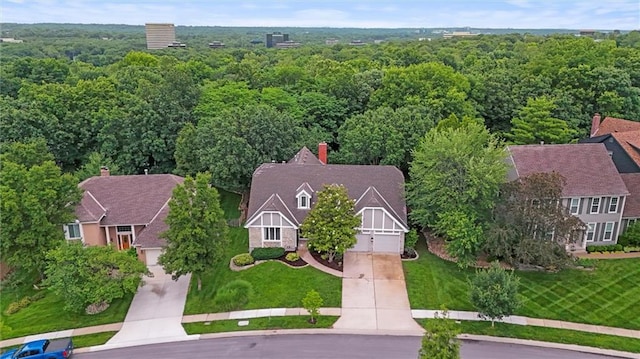 9602 W 116th St, Overland Park, KS 66210 - aerial view of property and surrounding area with a forest