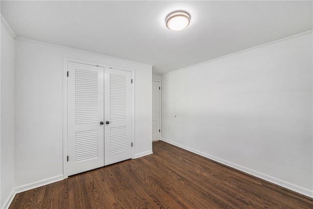 3818 W 52nd Ter, Roeland Park, KS 66205 - unfurnished bedroom with dark wood-style floors and a closet