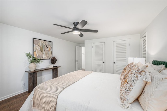 3818 W 52nd Ter, Roeland Park, KS 66205 - bedroom with two closets, wood finished floors, and ceiling fan