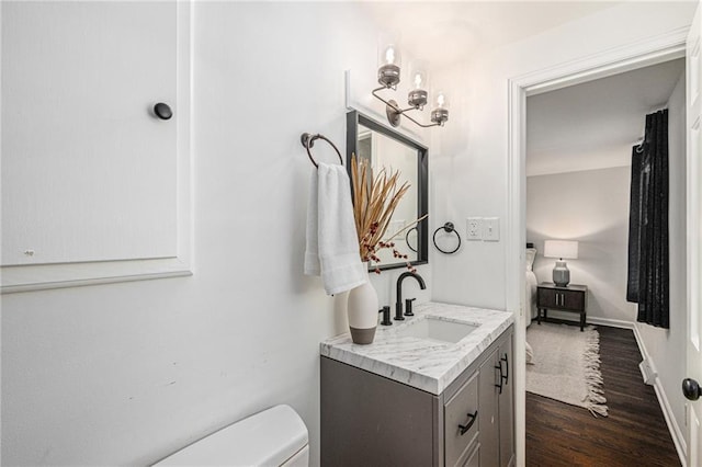 3818 W 52nd Ter, Roeland Park, KS 66205 - bathroom with vanity and wood finished floors
