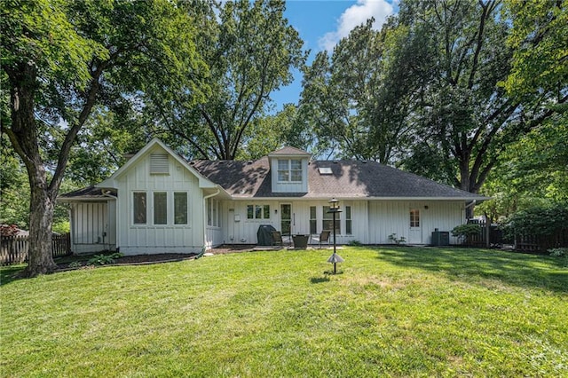 3818 W 52nd Ter, Roeland Park, KS 66205 - rear view of property with board and batten siding and roof with shingles