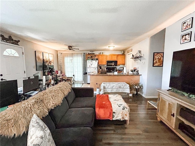21 Oak Crest Dr, Linn Valley, KS 66040 - living room with dark wood-style floors, ceiling fan, and a textured ceiling