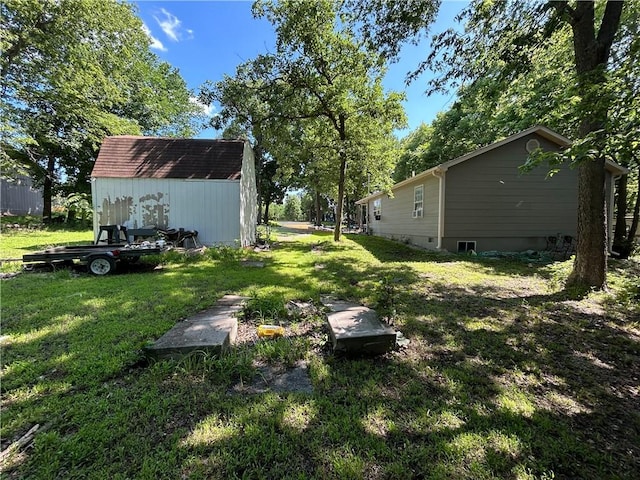 21 Oak Crest Dr, Linn Valley, KS 66040 - view of green lawn featuring a shed