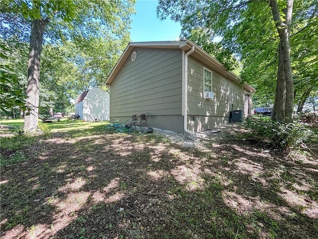 21 Oak Crest Dr, Linn Valley, KS 66040 - view of side of home with a cooling unit