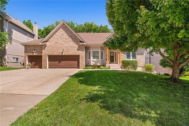 14740 W 128th St, Olathe, KS 66062 - single story home with brick siding, an attached garage, driveway, and a front yard