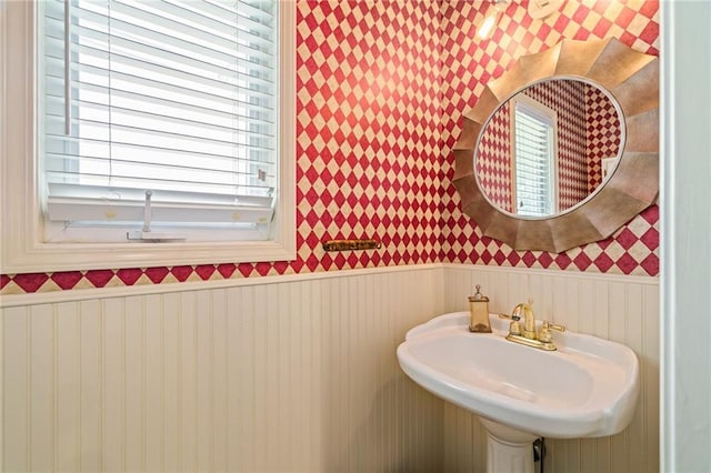 14740 W 128th St, Olathe, KS 66062 - bathroom featuring wallpapered walls and a wainscoted wall