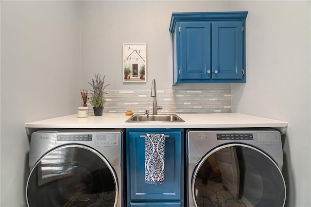 14740 W 128th St, Olathe, KS 66062 - laundry area with washing machine and clothes dryer and cabinet space