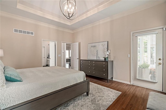 14740 W 128th St, Olathe, KS 66062 - bedroom with a chandelier, ornamental molding, a raised ceiling, dark wood-style floors, and access to exterior