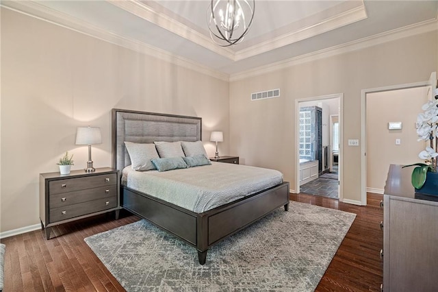 14740 W 128th St, Olathe, KS 66062 - bedroom featuring a chandelier, crown molding, dark wood finished floors, and a raised ceiling