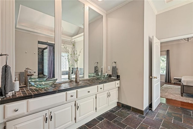 14740 W 128th St, Olathe, KS 66062 - bathroom with ornamental molding, vanity, and stone tile floors