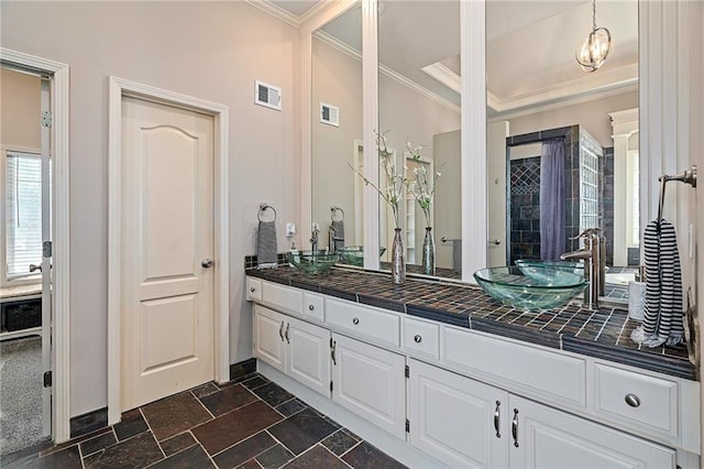 14740 W 128th St, Olathe, KS 66062 - full bath with ornamental molding, double vanity, and stone tile floors