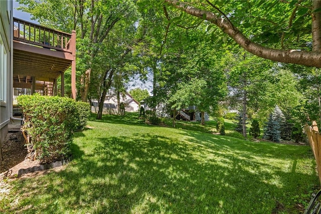 14740 W 128th St, Olathe, KS 66062 - view of yard featuring a wooden deck