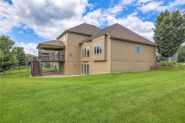 4517 N Sienna Rdg, Riverside, MO 64150 - back of property with stairs, a ceiling fan, a shingled roof, and a wooden deck