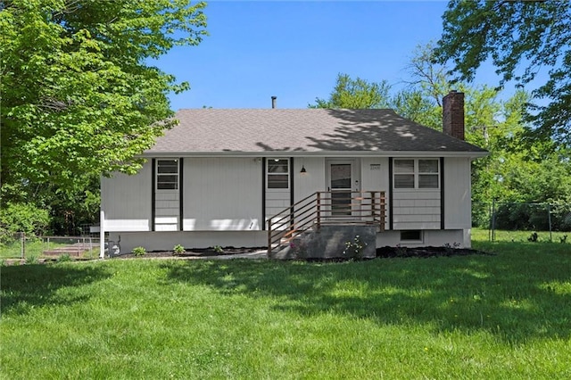 22420 W 73rd Ter, Shawnee, KS 66227 - view of front of home with a chimney and a shingled roof