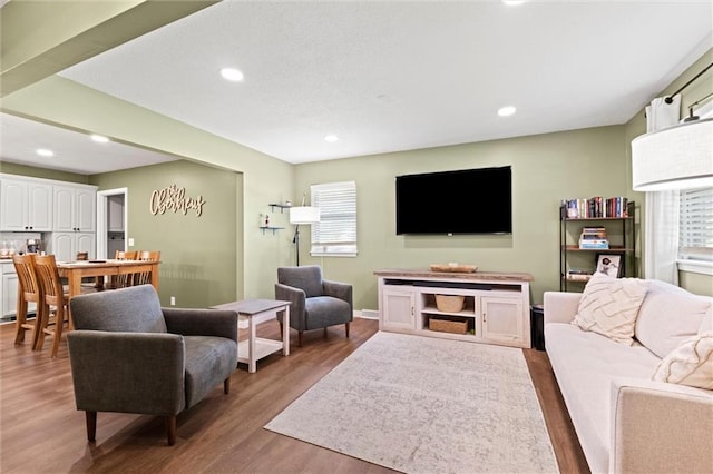 22420 W 73rd Ter, Shawnee, KS 66227 - living room with healthy amount of natural light, wood finished floors, and recessed lighting