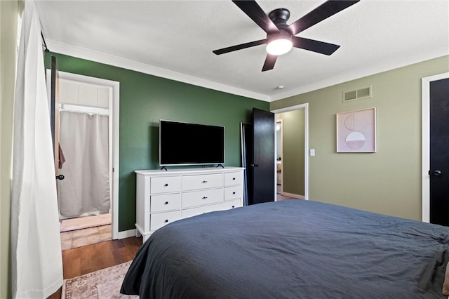 22420 W 73rd Ter, Shawnee, KS 66227 - bedroom featuring wood finished floors, ornamental molding, a ceiling fan, and a textured ceiling