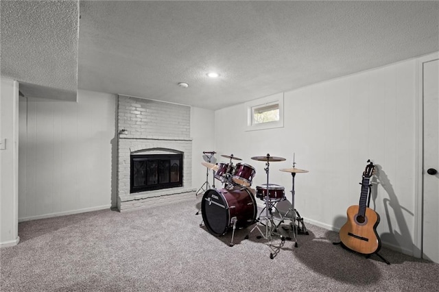 22420 W 73rd Ter, Shawnee, KS 66227 - rec room featuring a textured ceiling, carpet floors, and a brick fireplace