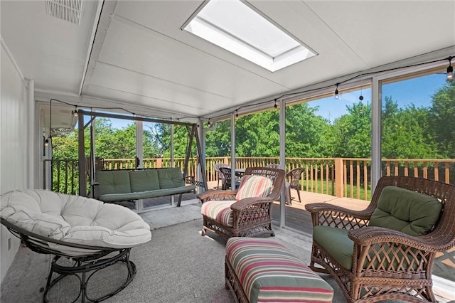 22420 W 73rd Ter, Shawnee, KS 66227 - sunroom / solarium with an outdoor living space, a skylight, view of scattered trees, and outdoor dining space