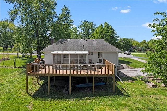 22420 W 73rd Ter, Shawnee, KS 66227 - back of house featuring a deck, a lawn, and roof with shingles