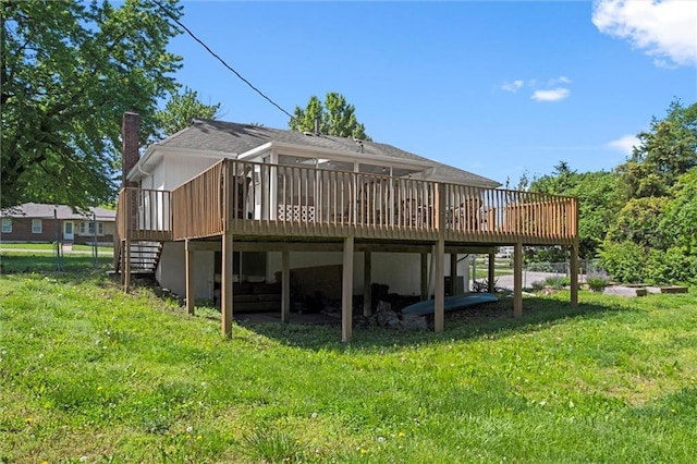 22420 W 73rd Ter, Shawnee, KS 66227 - back of property with a deck, a yard, and a chimney