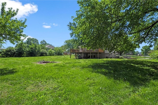 22420 W 73rd Ter, Shawnee, KS 66227 - view of green lawn with a wooden deck