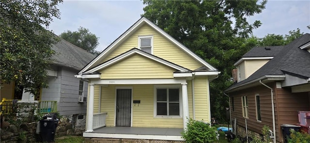 2524 Askew Ave, Kansas City, MO 64127 - view of front of home featuring a porch