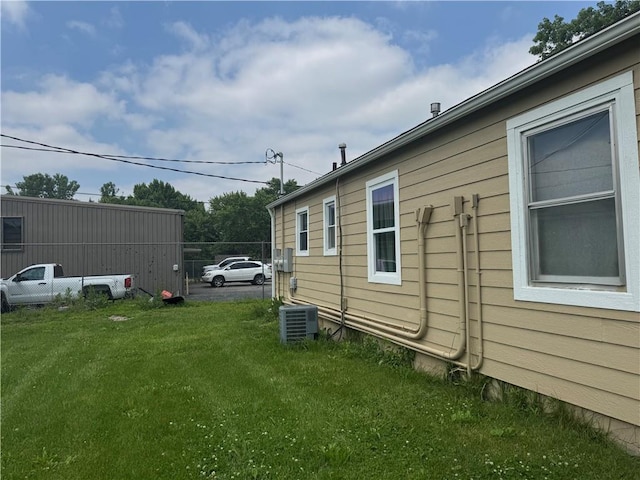 115 S Julia St, Olathe, KS 66061 - view of home's exterior with a yard