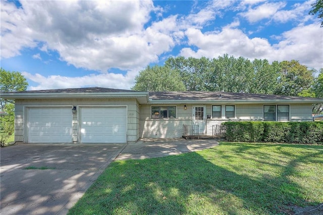 1933 N 83rd Ter, Kansas City, KS 66112 - ranch-style home with a garage, concrete driveway, and a front lawn