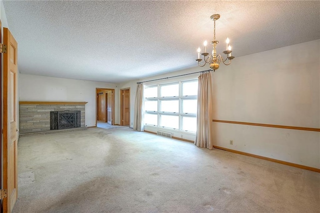 1933 N 83rd Ter, Kansas City, KS 66112 - unfurnished living room featuring a chandelier, carpet flooring, a textured ceiling, and a fireplace