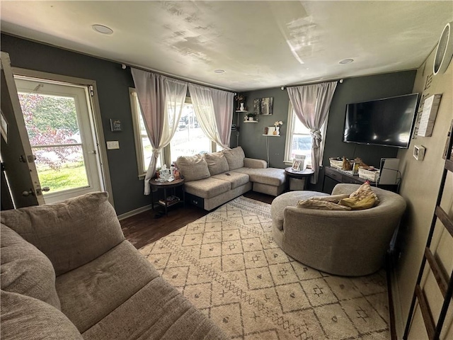 1212 S Harris Ave, Independence, MO 64052 - living room with wood finished floors and baseboards