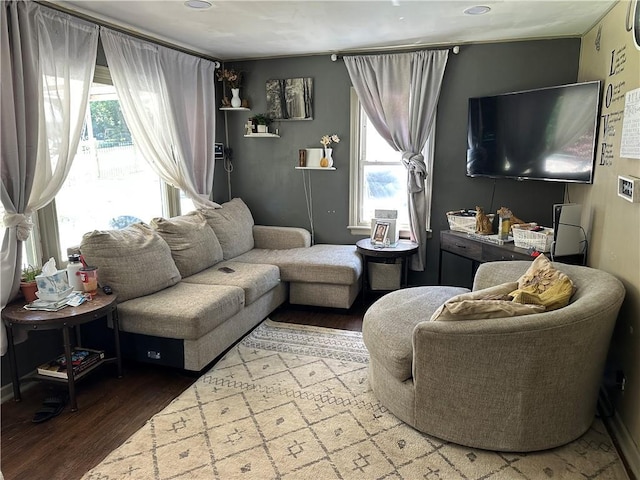 1212 S Harris Ave, Independence, MO 64052 - living area featuring wood finished floors and healthy amount of natural light