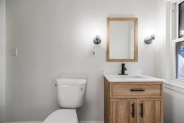 4428 N Monroe Ave, Kansas City, MO 64117 - bathroom with toilet and vanity